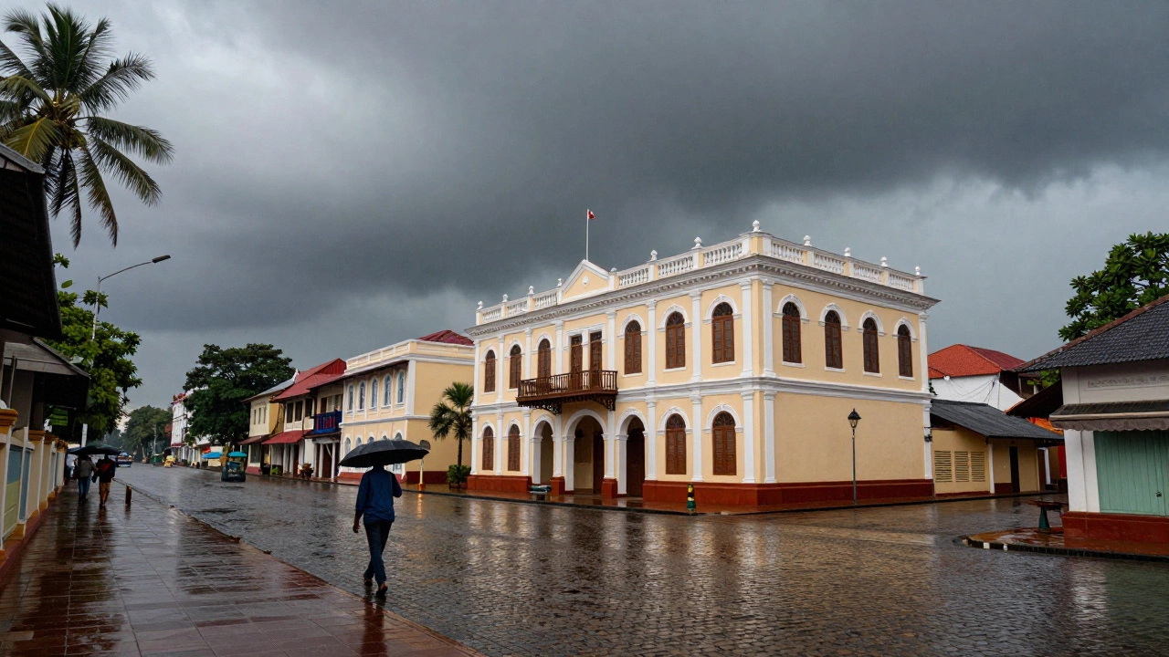 Wet colonial streets in Pondicherry reflecting buildings under stormy sky